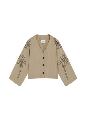Chaqueta beige de manga larga con botones, mangas anchas y un diseño lineal negro de palmeras en ambos brazos y hombros.