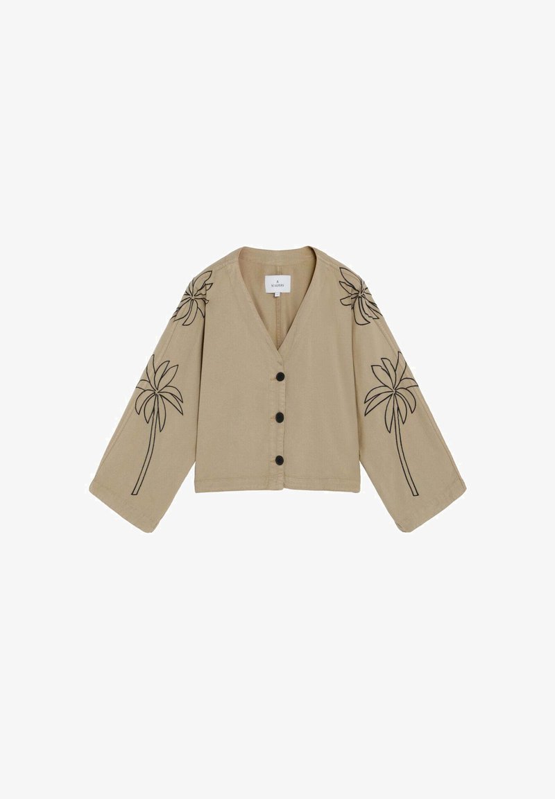 Chaqueta beige de manga larga con botones, mangas anchas y un diseño lineal negro de palmeras en ambos brazos y hombros.