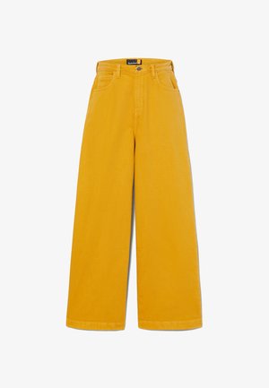 Pantalons en coton jaune à jambes larges avec une taille haute, un design à cinq poches, des coutures contrastées, dotés d'une fermeture à bouton et de passants de ceinture.