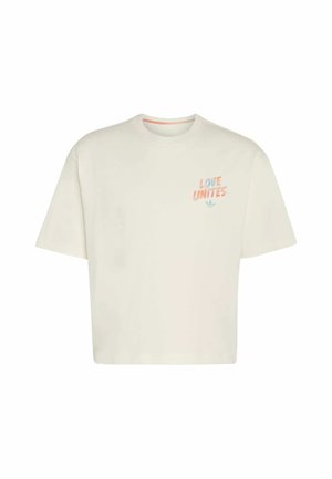 T-shirt à manches courtes de couleur crème avec le texte « LOVE UNITES » et un petit logo aux couleurs pastel sur la poitrine gauche.