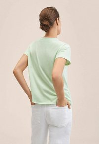 Mango Triko s potiskem - light green