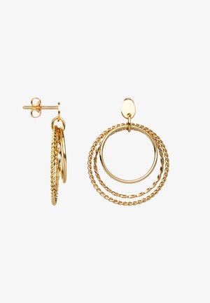 Boucles d’oreilles créoles en or avec trois cercles concentriques texturés, un lisse, un torsadé en corde et un facetté, attachés à un petit clou ovale.