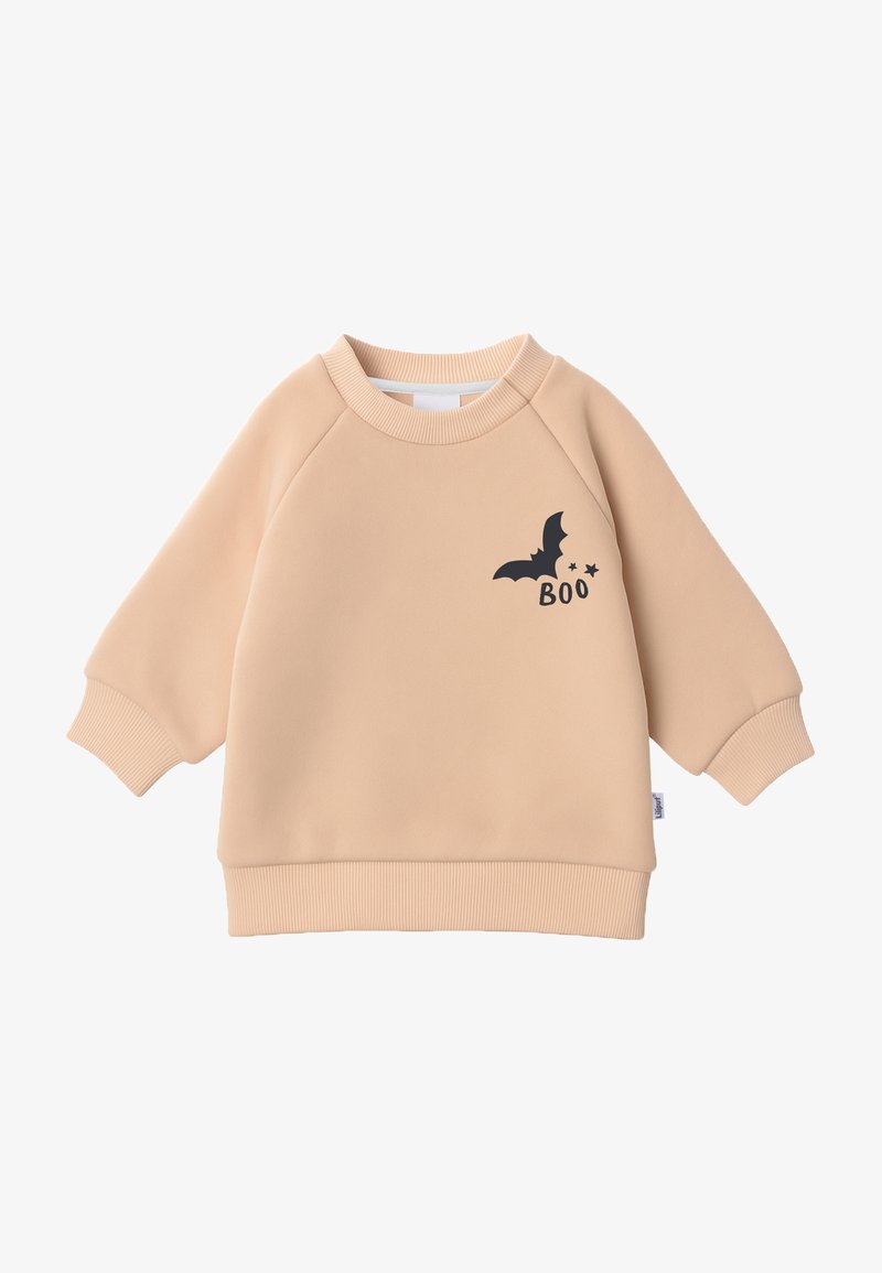Pfirsichfarbener Pullover mit Rundhalsausschnitt, Raglanärmeln, gerippten Bündchen und schwarzem Vampirfledermaus- sowie "Boo"-Grafik auf der Vorderseite.