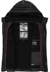 Black padded jacket with a fleece interior, featuring red accents, multiple inner pockets, and labels stitched on the lining.