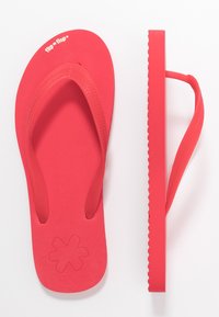 Red flip-flops with a textured footbed, smooth straps, and a scalloped edge. Brand name "flip * flop" printed on the upper strap.