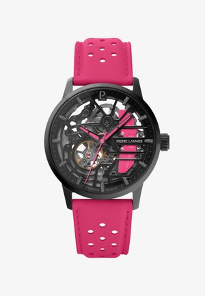 Orologio scheletro nero con cinturino in silicone perforato rosa. Presenta ingranaggi visibili e un design minimalista con accenti rosa e argentati.