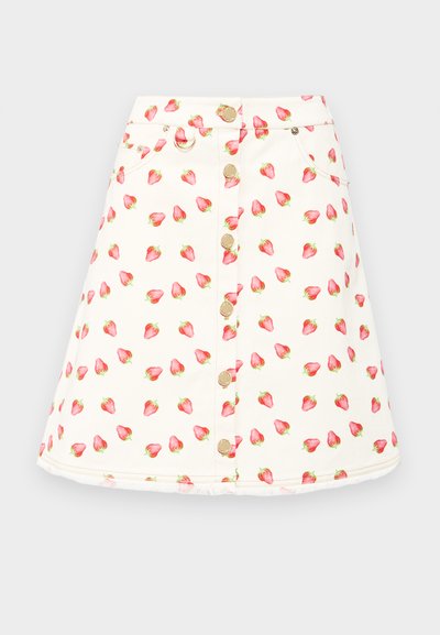 Egy krém színű, A-vonalú szoknya, epermintával, fémből készült gombokkal az elején és oldalsó zsebekkel. Puha pamutszövet.