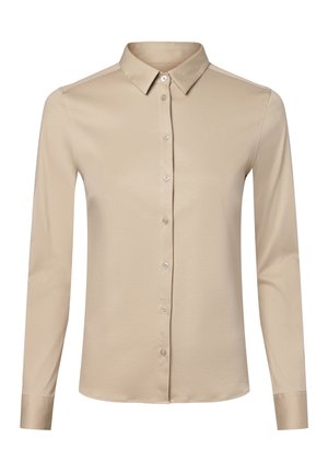 Chemise beige à manches longues boutonnée, avec col pointu et poignets à un seul bouton, présentée sur fond blanc.