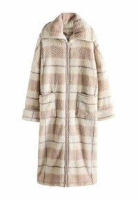 Długi, pluszowy, beżowy płaszcz w kratę z wysokim kołnierzem, zapięciem na zamek i dwiema przednimi kieszeniami. Miękka, puszysta struktura z kontrastowymi paskami.