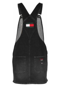 Černé denimo overall šaty s nastavitelnými popruhy, předními kapsami a logem v zelené, červené a bílé barvě.