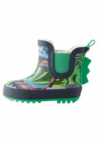 Botte en caoutchouc imperméable colorée arborant un motif d'animaux de la jungle vibrant, avec un accent flexible vert et un talon texturé bleu marine pour une bonne adhérence.