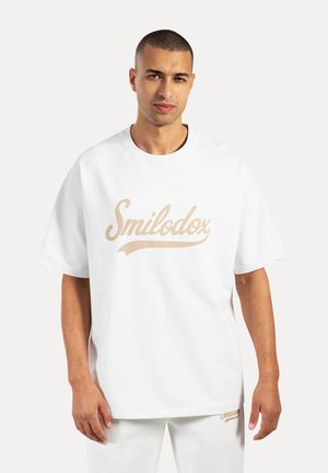 LORIK - Camiseta estampada - creme