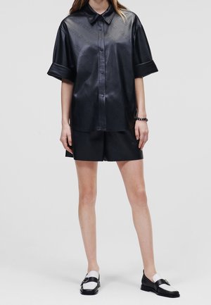 Blusa - black