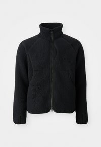 Giacca in pile nera con zip completa, colletto alto, tessuto testurizzato, due tasche frontali e aperture per il pollice sulle maniche lunghe.