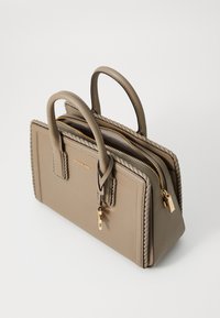 Beige leather handbag with two top handles, braided edge detailing, dual zip closures, and gold hardware accents.