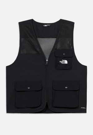 Veste noire sans manches avec panneaux en mesh, fermeture éclair devant, trois poches à rabat, et logo blanc « The North Face » sur la poche supérieure droite.