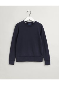 Sweatshirt bleu marine en mélange de coton, avec un col rond, des manches longues, des poignets et un ourlet côtelés, et un petit détail de logo sur la poitrine.
