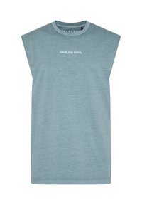 Sleeveless teal t-shirt made of soft fabric, featuring a round neckline and bold white text reading "HARLEM SOUL" on the front.