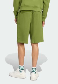 adidas Originals Tepláky - tech olive