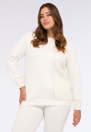- Bluza