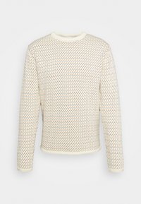 Krämfärgad tröja med ett strukturerat mönster av små orange och blå hjärtan. Har rund hals, långa ärmar och ribbade muddar.