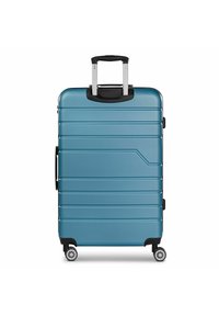 Hartschalenkoffer in Teal mit horizontalen Rillen, silbernem Teleskopgriff, Doppelrollen, seitlichem Tragegriff und schwarzen Akzenten.