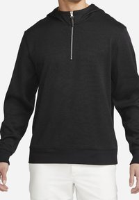 Svart pullover hoodie gjord av mjukt tyg, med halvdragkedja fram, långa ärmar och ribbade muddar och fåll.
