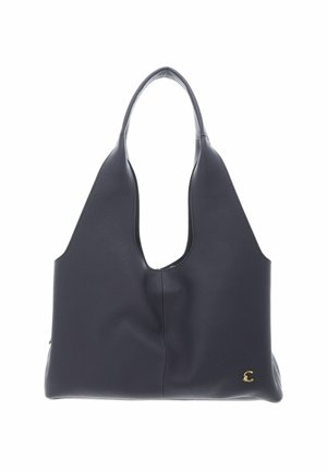 Bolso tote de cuero negro con un asa y pequeño logo dorado en la esquina inferior derecha, mostrado sobre fondo blanco.