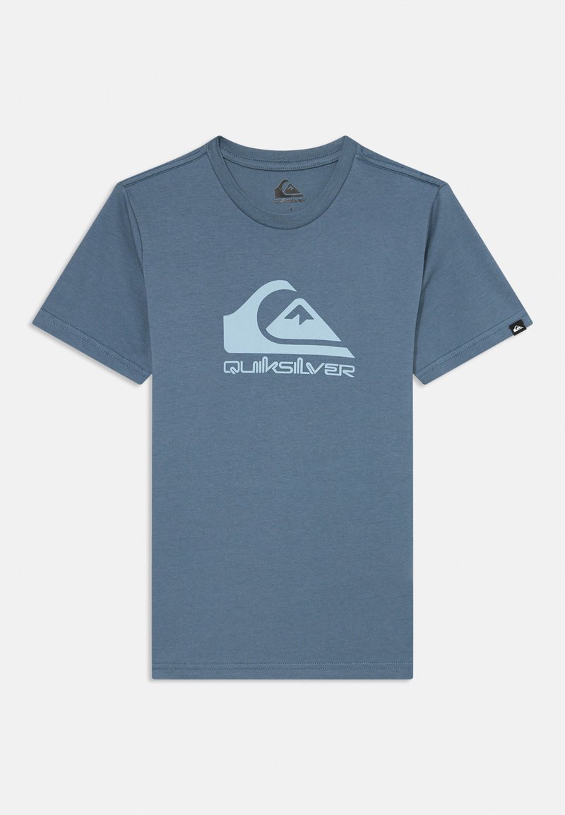 Blue cotton t-shirt with short sleeves. Features a light blue Quiksilver logo and mountain graphic printed on the front. Round neckline.