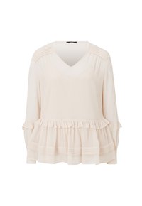 Blouse crème à manches longues avec col en V, détails plissés aux épaules, et volants en étages à la taille et aux poignets.