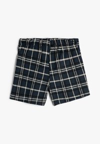 Rutiga shorts i bomull med en marinblå bas, svart och vit rutmönster, samt ett elastiskt midjeband för flexibel passform.