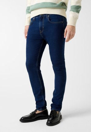 - Jeansy Skinny Fit