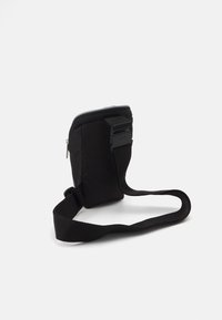 adidas Originals SMALL ITEM - Bum bag - black/reflective silver