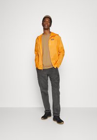 Patagonia HOUDINI - Corta-vento - cloudberry orange