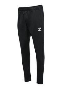 Pantaloni sport negri cu talie elastică și logo alb Hummel pe coapsa superioară, croială slim, fără buzunare vizibile.