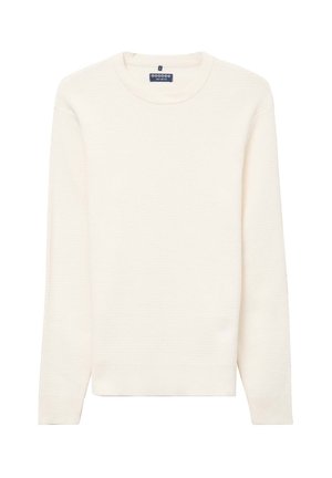 Cremefarbener Pullover mit gerippter Textur, rundem Halsausschnitt und langen Ärmeln. Seitliche Schlitze am Saum für mehr Bewegungsfreiheit.