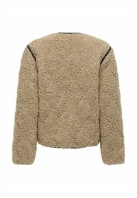 Veste beige à manches longues avec texture en laine, surface douce et duveteuse, avec des accents de coutures noires sur les épaules, vue de dos.