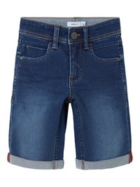 Denim shorts in dark blue with rolled cuffs. Features five pockets and orange stitching. Fabric has a smooth texture with slight stretch.