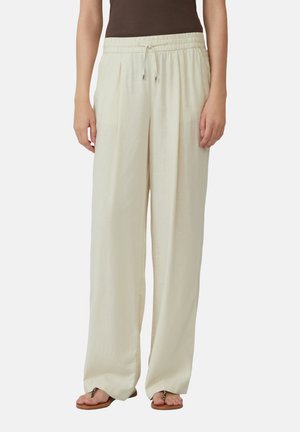 Lange broek in lichtgewicht, crème kleurige stof. Voorzien van een elastische tailleband met een trekkoord en een relaxte pasvorm. Gladde textuur.