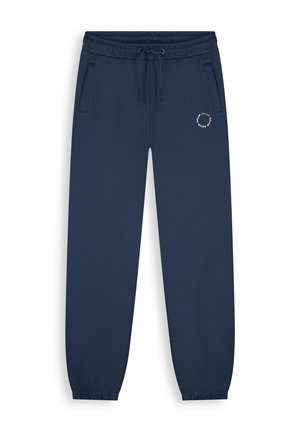 Marineblauwe joggerbroek met elastische tailleband en boorden, vooraan een trekkoord, twee zijzakken en een klein cirkelvormig logo op de linker bovenbeen.