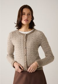 Knitted cardigan in light beige with a textured pattern, featuring a round neckline, long sleeves, and large pearl buttons down the front.