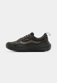 Black and olive green athletic shoes with a textured sole, lace-up design, and small tongue pull tab. Features mesh and suede materials.