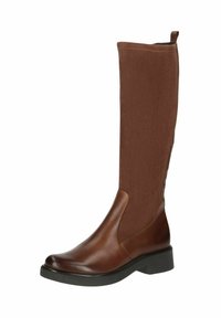 Botte en cuir marron hauteur genou avec un dessus en tissu doux, présentant un bout arrondi, un petit talon en bloc et des surpiqûres ton sur ton le long des coutures.