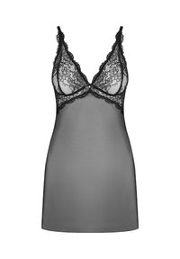 Czarna koronkowa koszulka na ramiączkach z przezroczystym wzorem, regulowanymi ramiączkami oraz falbaniastym wykończeniem z koronki w okolicy biustu i dołu.