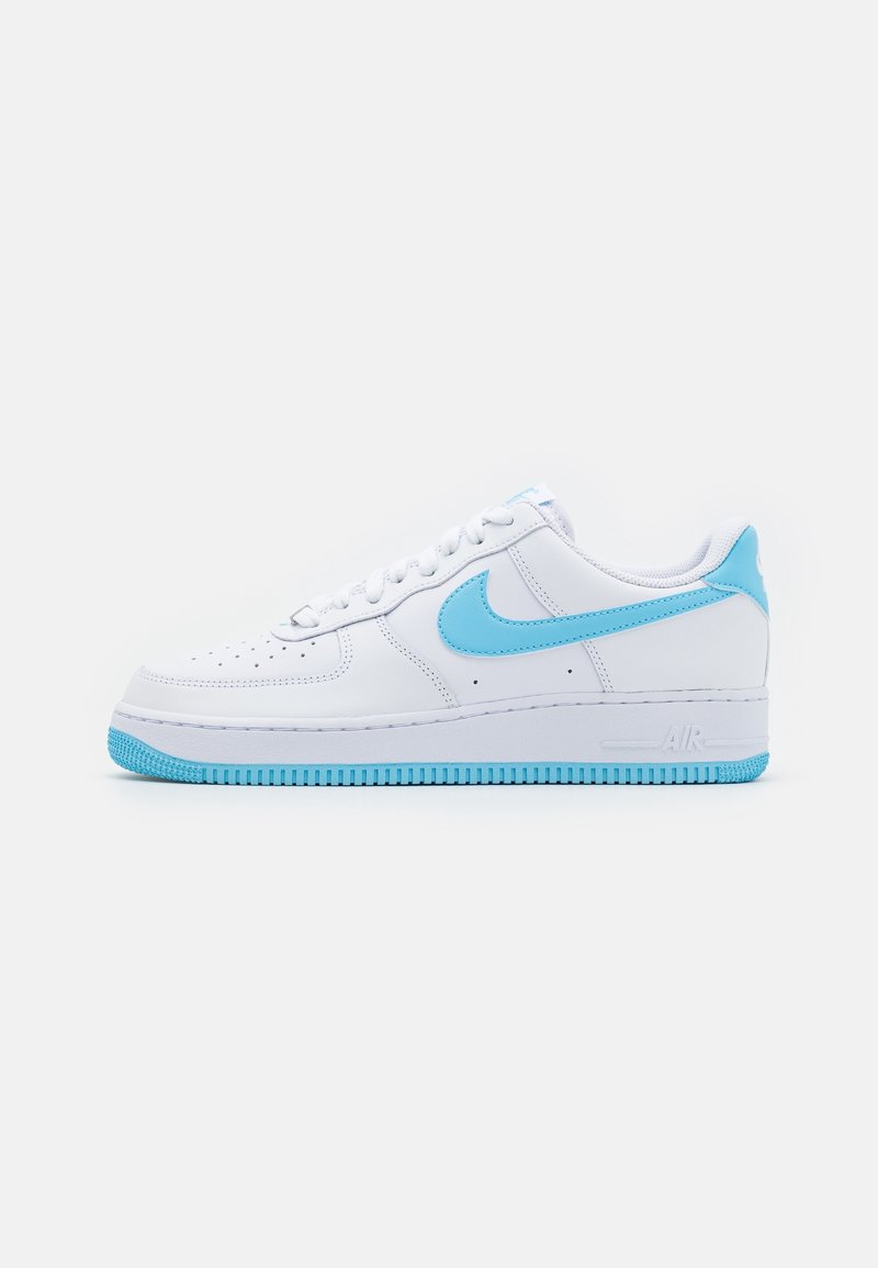 Nike Air Force 1 sneakers in white leather with light blue accents. Rounded toe, flat laces, and textured rubber sole in matching blue.