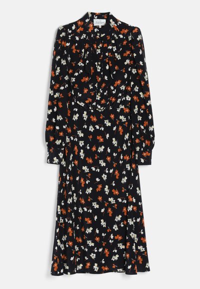 Robe midi noire à manches longues avec imprimé floral orange et blanc, taille froncée et poignets boutonnés.