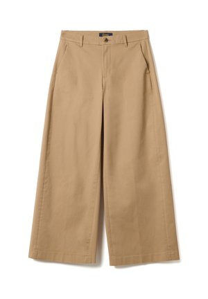 Beige Hose mit weitem Bein, Gürtelschlaufen, vorderer Knopfverschluss und seitlichen Taschen, flach auf weißem Hintergrund präsentiert.