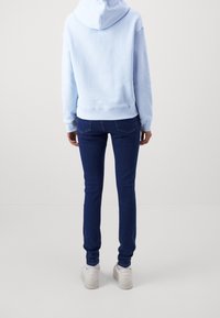 Tommy Jeans Jersey con capucha - light blue