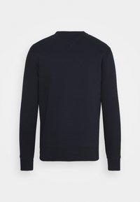 Black sweatshirt with long sleeves, round neckline, and ribbed cuffs. Made from a soft cotton blend. No visible logos or patterns.