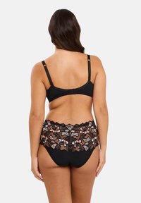 Set di lingerie in pizzo nero con cintura in pizzo floreale e ricami colorati, schiena liscia, spalline regolabili e chiusura con gancio.